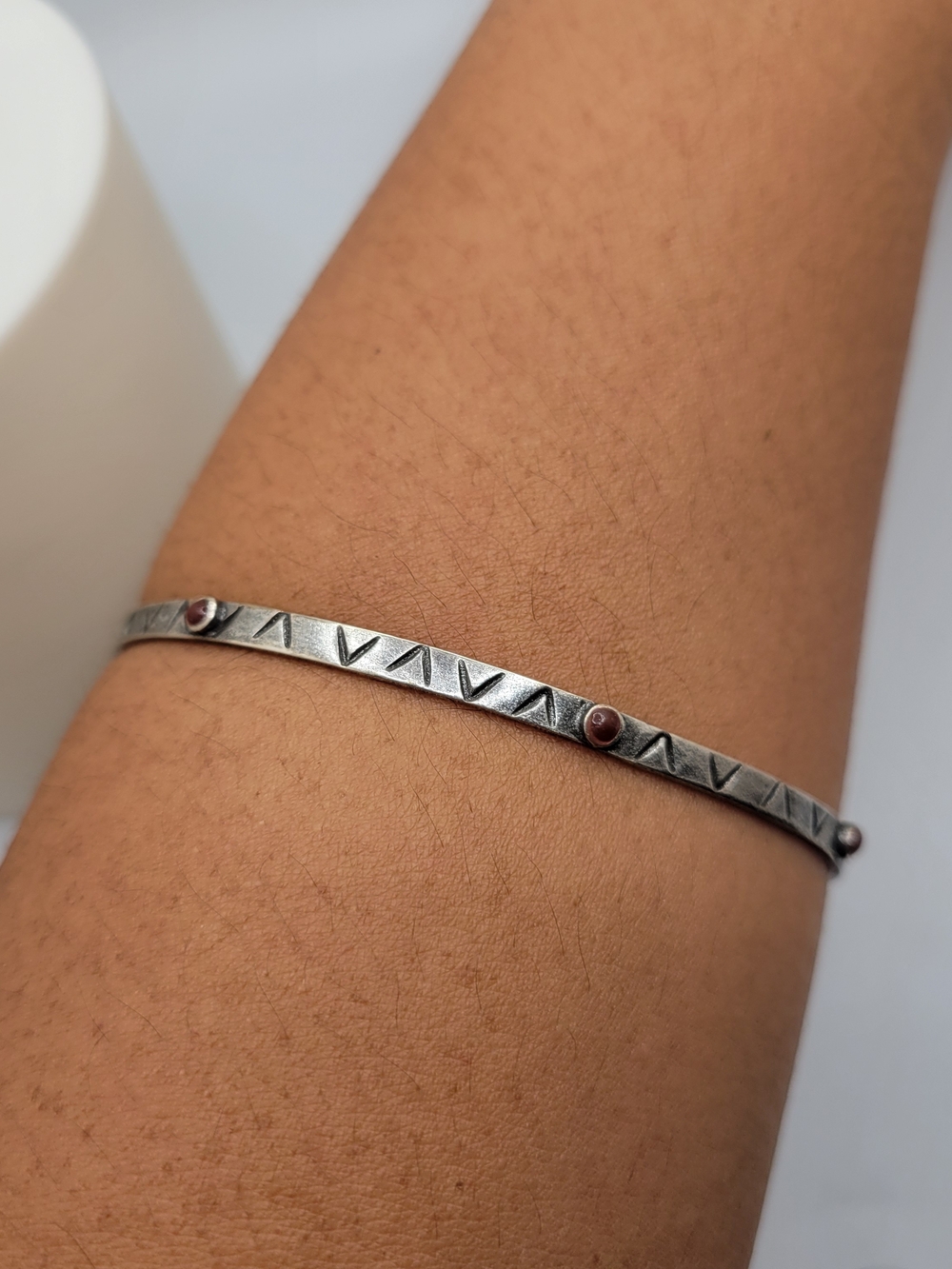 Silver-Tone Bangle Bracelet with Rose Accents
